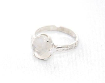 REEF: Oval Moonstone Solitaire Ring with Coral Textured Band in Silver