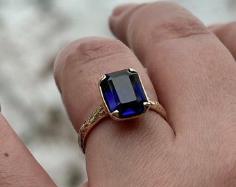 REEF: 10k Yellow Gold Ceylon Cornflower Blue Lab Sapphire Emerald Cut Solitaire Ring