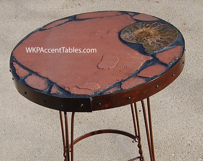 Ammonite Pedestal: a 20 1/2" diameter by 29" tall natural stone topped table featuring an ammonite fossil and mid century wire base