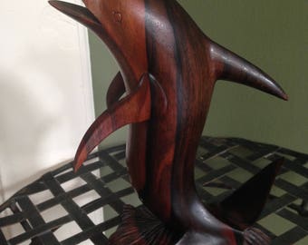 Hand carved exotic wood dolphin