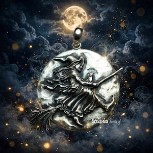 May include: A circular silver pendant featuring a raised relief of a witch in a pointed hat riding a broomstick, with a small cat perched behind. The metal has an oxidized finish, and the text Stoixeio jewelry is printed in the lower right corner.