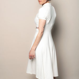 Knee length jersey A-line dress with circle skirt and lace inset zdjęcie 3