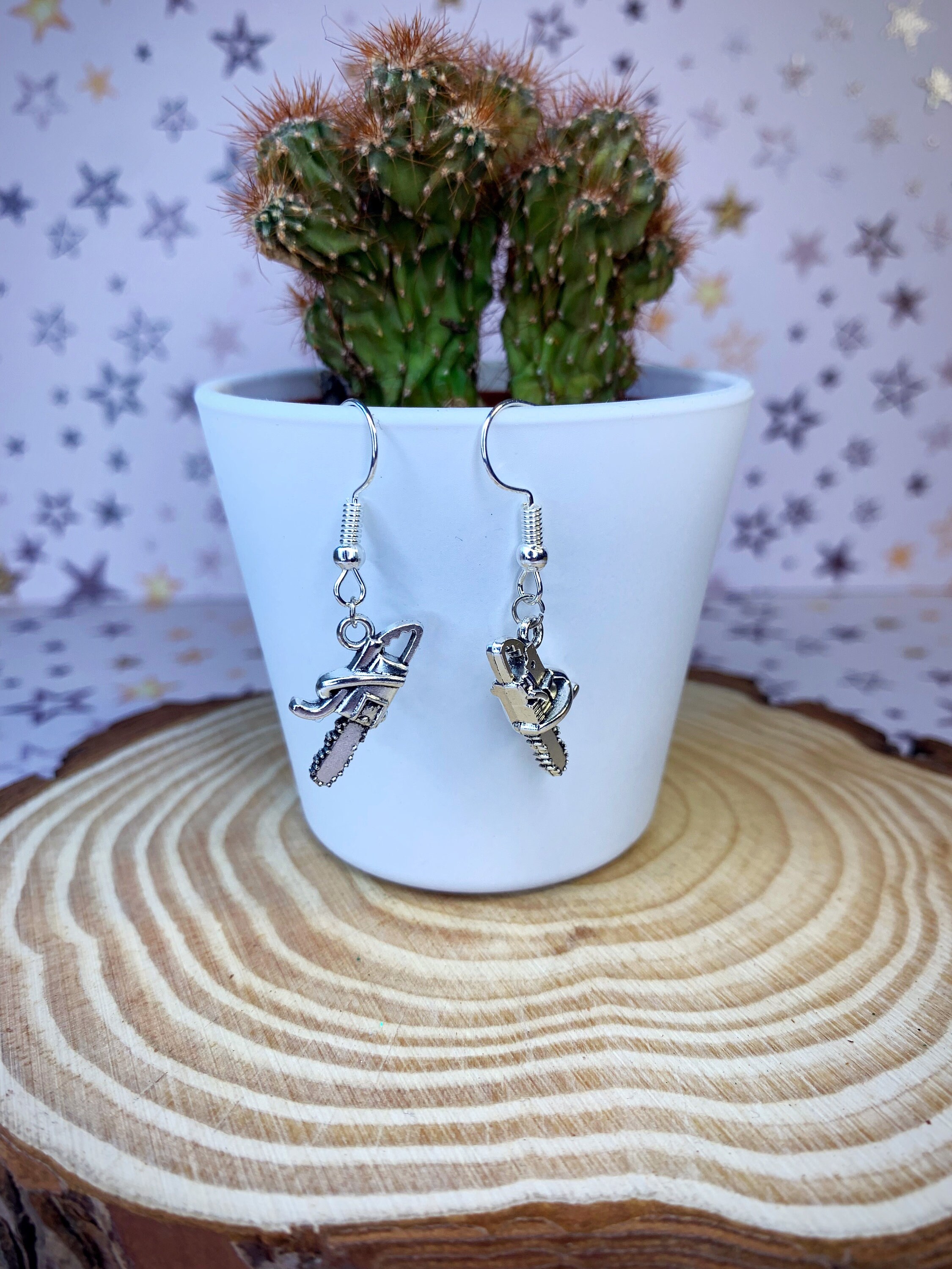 Chainsaw Earrings - Etsy Singapore CHAINSAW BLADE AND FLOWER EARRING