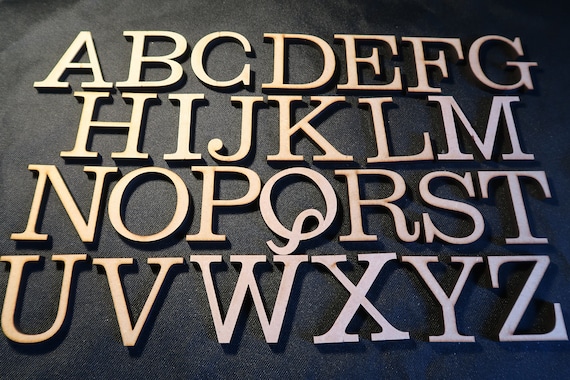 laser cut wood/ MDF 6mm thick capital letters, Clarendon font , various sizes, wood, chunky, block capitals and numbers.
