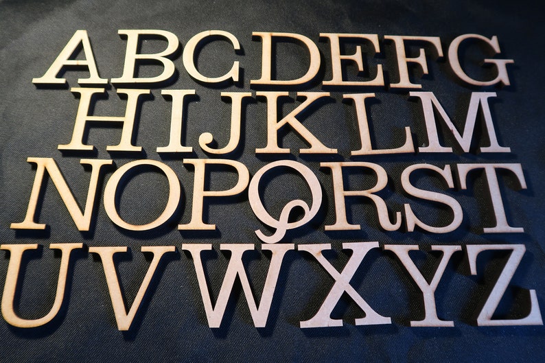 laser cut wood/ MDF 6mm thick capital letters, Clarendon font , various sizes, wood, chunky, block capitals and numbers. image 1