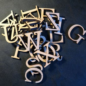 laser cut wood/ MDF 6mm thick capital letters, Clarendon font , various sizes, wood, chunky, block capitals and numbers. image 7