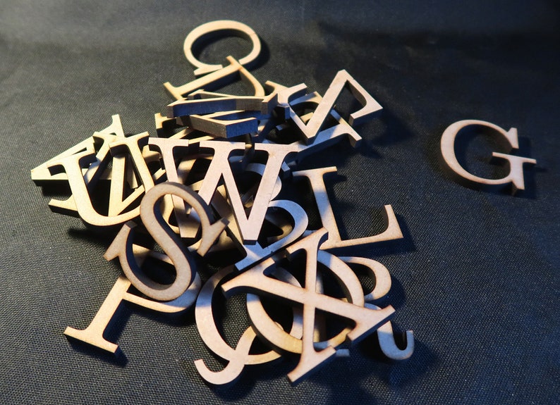 laser cut wood/ MDF 6mm thick capital letters, Clarendon font , various sizes, wood, chunky, block capitals and numbers. image 6