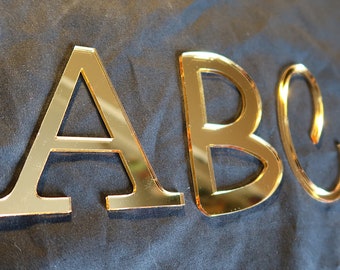 Self Adhesive Silver or gold mirrored letters and numbers, acrylic, any size or font, any logo. Weddings, table numbers,  coloured mirror.