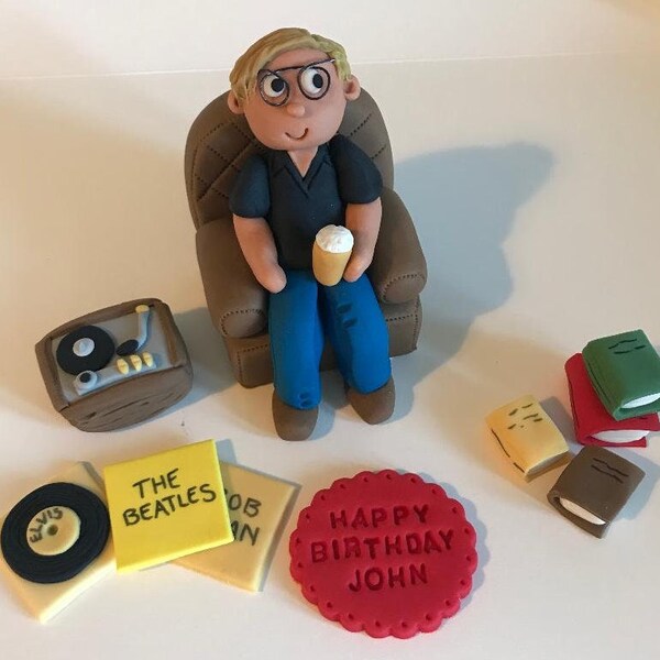 Handmade, edibible, figure sitting in Armchair with 3 accessories of your choice and a plaque with a message
