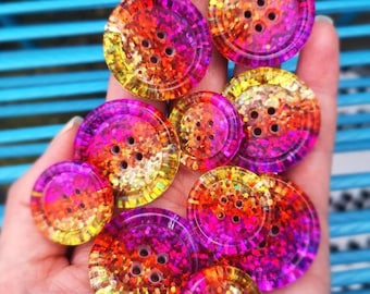 Malibu Sunset dazzler buttons - purple - pink - orange - gold - yellow - glitter. Club Tropicana-tastic! 21mm 30mm 35mm 50mm