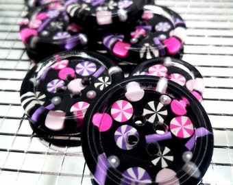 The Sweets Of London. Black glitter candy sweets buttons. Pops of hot pink, baby pink, lilac & pearls. 15mm - 21mm - 30mm - 35m - 50mm.