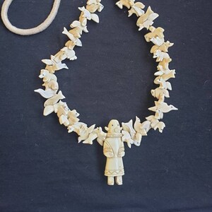 Hand carved Bone Buffalo dancer Fetish Necklace with mixed bone animals. 30-32 &quot;