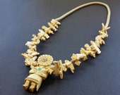 Hand Carved Natural Buffalo Bone Sun Kachina with Mixed Animals Fetish Necklace