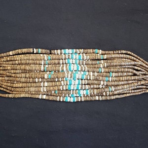 Graduated brown coco beads with white clam shell and synthetic turquoise beads combinations. 16&quot;