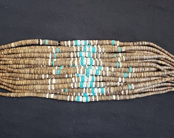 Graduated brown coco beads with white clam shell and synthetic turquoise beads combinations. 16"