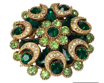 Broche verte ronde Sphinx des années 1950