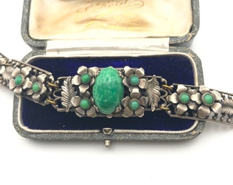 Bracelet tchèque neiger art déco : verre vert, fleurs argentées