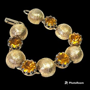 1950s Large Yellow glass domed Gold tone bracelet