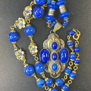 Neiger Brothers 1920/1930s Czech Lapis Blue pendant with a beaded necklace with flower panels