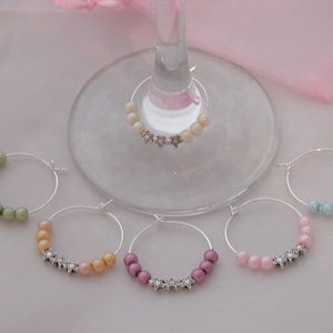 Set mit 6 handgefertigten Sternen-Weinglas-Charms