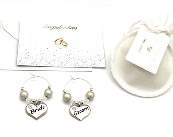 Set of 2 Bride and Groom Glass Charms with White Velvet Gift Bag and Gift Card