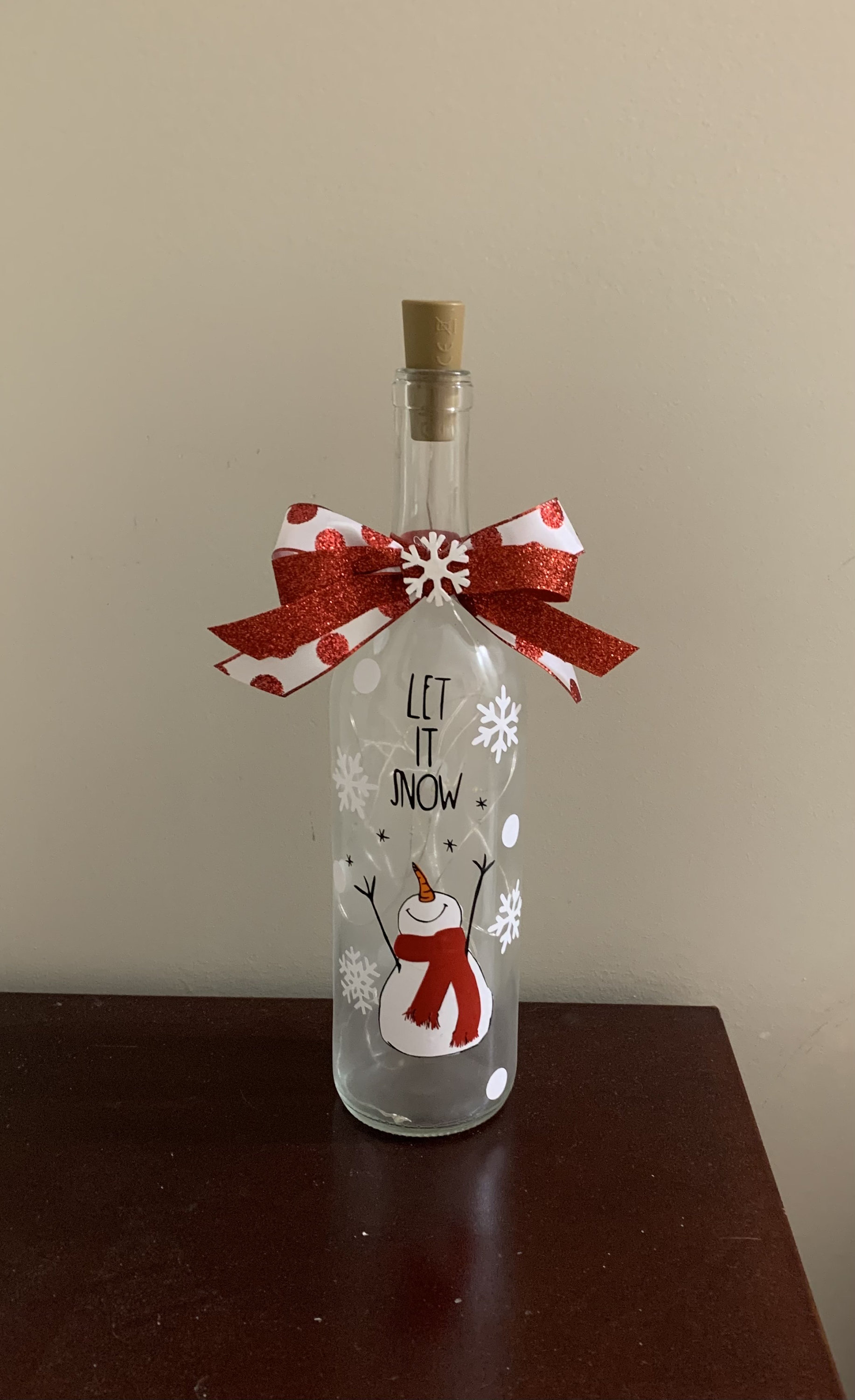 Lighted Wine Bottle With Swirling Glitter Christmas Cheer Design Snow   Lighted wine bottles, Christmas wine bottles, Wine bottle diy crafts