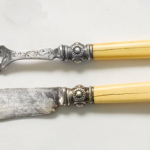 Vintage Yellow Bone Handle Knife and Fork