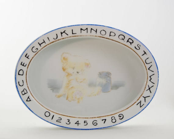 Piatto riscaldante per bambini, orsacchiotto giapponese in ceramica ovale  antico -  Italia