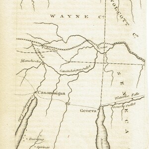 May include: Antique black and white map of the Ontario region, featuring the names of cities and lakes. The map includes the text "L. Ontario", "Wayne Co", and "Seneca Lake". The map is printed on aged paper.