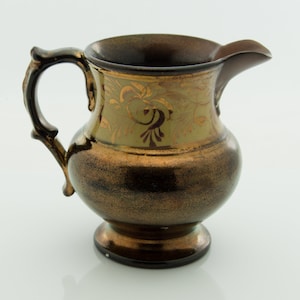 Antique Copper Luster Creamer with Cream Floral Decoration