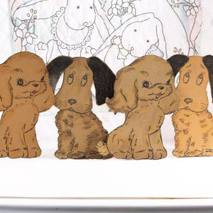 Cuatro perros de cartón recortados de 18 cm (cocker spaniel), década de 1950