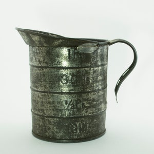 Antique Tin Measuring Cup with Spout and Handle with Measurement in Pints and Gills