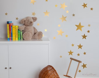 Gold Star Vinyls. Decoration with decorative vinyl gold stars. Wall Stickers Golden Stars Decoration. Glitter gold