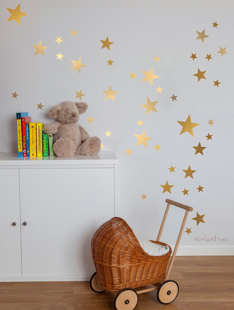 Gold Star Vinyls. Decoration with decorative vinyl gold stars. Wall Stickers Golden Stars Decoration. Glitter gold image 1