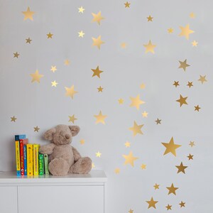 Gold Star Vinyls. Decoration with decorative vinyl gold stars. Wall Stickers Golden Stars Decoration. Glitter gold image 9