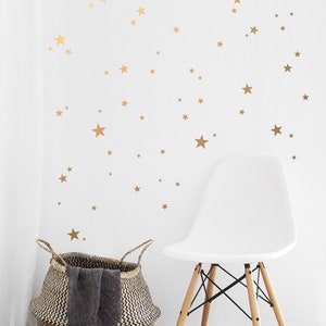 Gold Star Vinyls. Decoration with decorative vinyl gold stars. Wall Stickers Golden Stars Decoration. Glitter gold image 7