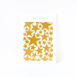 Gold Star Vinyls. Decoration with decorative vinyl gold stars. Wall Stickers Golden Stars Decoration. Glitter gold image 2