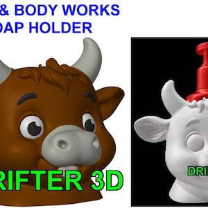 May include: A brown cow-shaped soap holder with gray horns and white eyes, and a white cow-shaped soap holder with gray horns and a red pump dispenser. Both items feature the text DRIFTER 3D in green, and the text BATH & BODY WORKS SOAP HOLDER.
