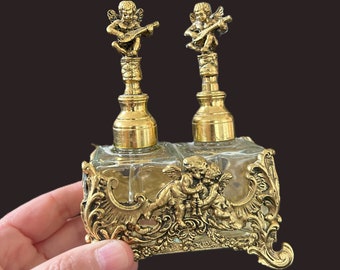 Midcentury CRYSTAL perfume bottles with CHERUB stoppers in ormolu holder by GLOBE, refillable perfume bottle