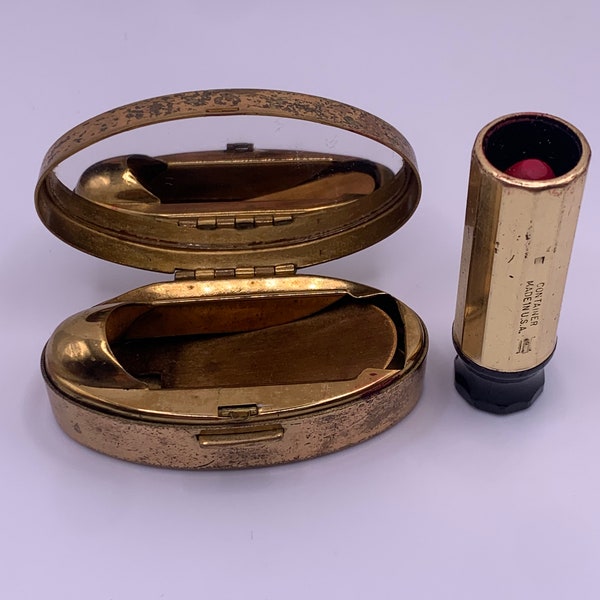 Vintage 1950s Max Fabrics Lippenstift-Puder mit Spiegel - ovale goldfarbene Lippenstift-Puderdose mit Spiegel - schwarze Emaille mit goldenem Blumen-Inlay