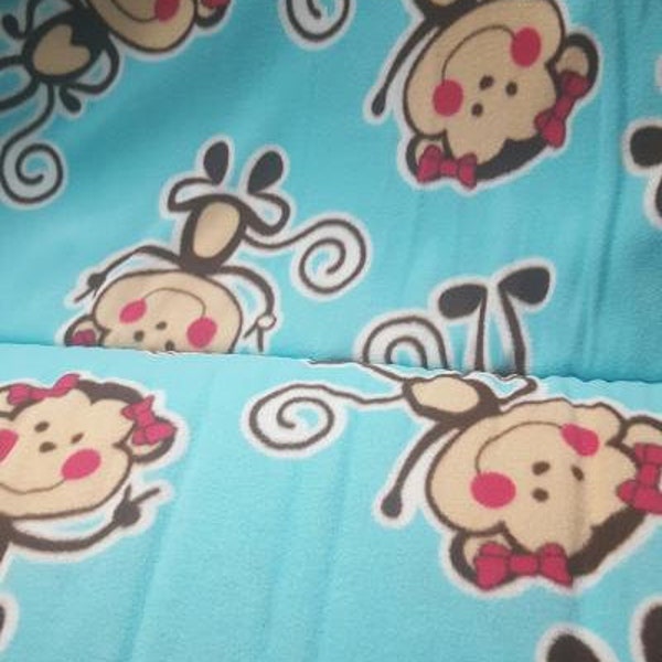 Monkey on aqua background micro-fleece by the yard bty