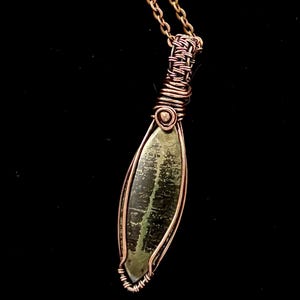 May include: A set of three ceramic mugs with a speckled, matte finish. The mugs are in shades of cream, light gray, and dark gray. Each mug has a simple, minimalist design, perfect for coffee or tea.