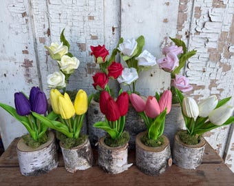 Inserciones de tulipanes y rosas