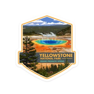 May include: A colorful sticker featuring a scenic view of Grand Prismatic Spring in Yellowstone National Park. The sticker has a yellow and orange border with the text "Yellowstone National Park - Grand Prismatic Spring" in black and white.