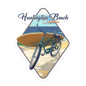 May include: A sticker featuring a beach scene with a teal bicycle, a surfboard, and the text "Huntington Beach California." The artwork is set against a backdrop of the ocean and sky, with a diamond-shaped border.