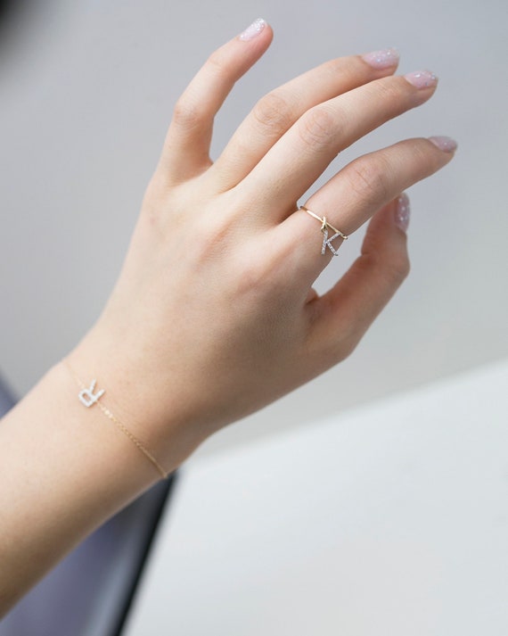 bague or avec breloque bague or avec breloque