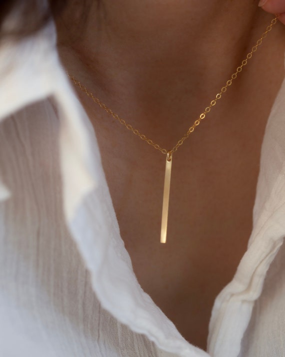 Simple gold clearance bar necklace