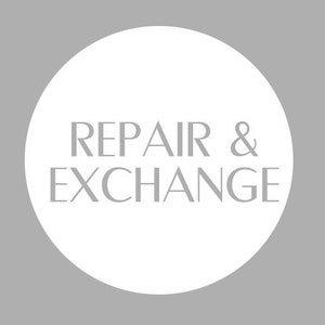 May include: White circle with the text "REPAIR & EXCHANGE" in gray lettering on a gray background. The text "E&E PROJECT JEWELRY" is in gray lettering at the bottom of the image.