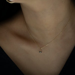 14k gold evil eye necklace with Diamond