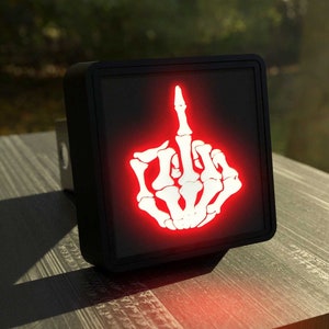 Skeleton Middle Finger LED Hitch Cover - Brake Light